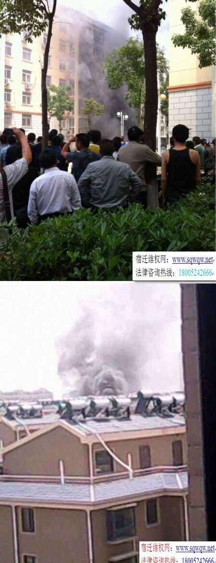 沭阳一小区内面包车上煤气罐发生爆炸图
